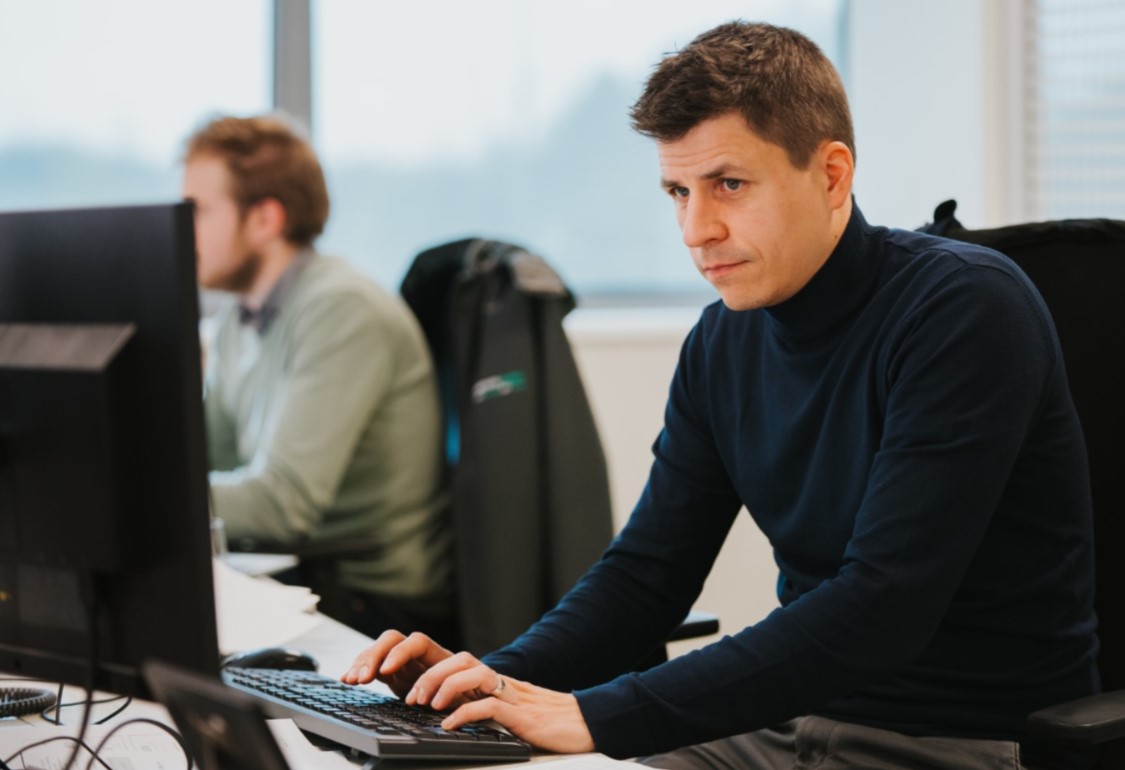 Eurotranspharma office employee works on a computer
